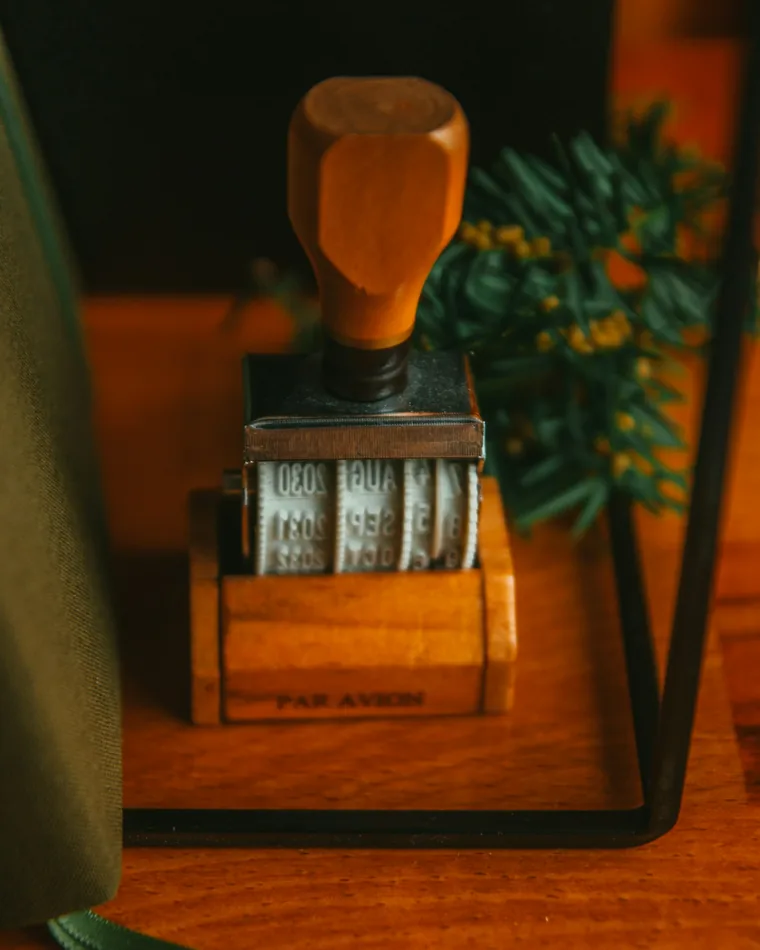 Wooden date stamp on a desk