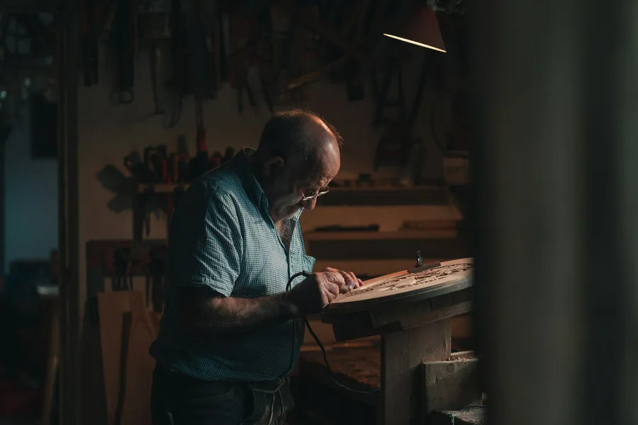 Craftsman working at a bench in a workshop